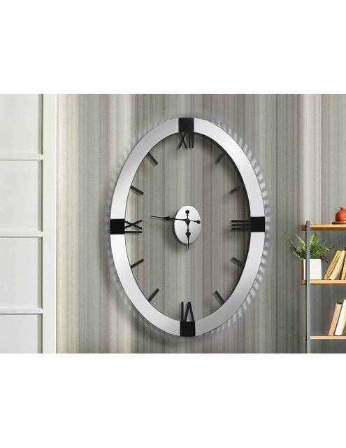 Te presentamos el reloj de pared oval times y kairos 120. Un diseño elegante y vanguardista con aro de espejos viselados.