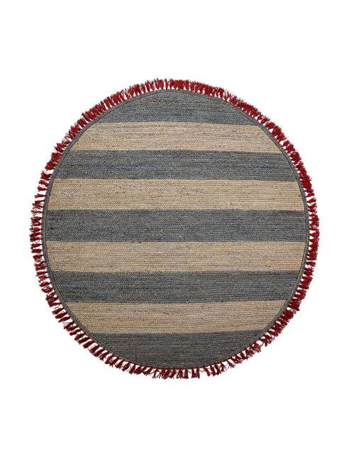 Elegante y original alfombra circular yute mogambo de diseño rústico elaborada por Hup Interiorismo.
