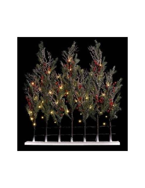 Bosque navideño nevado iluminado formado por siete arbolitos de 80 cm. alineados en una valla de 70 cm.